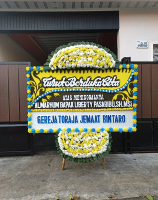 Papan Bunga Duka di Sungai Medang